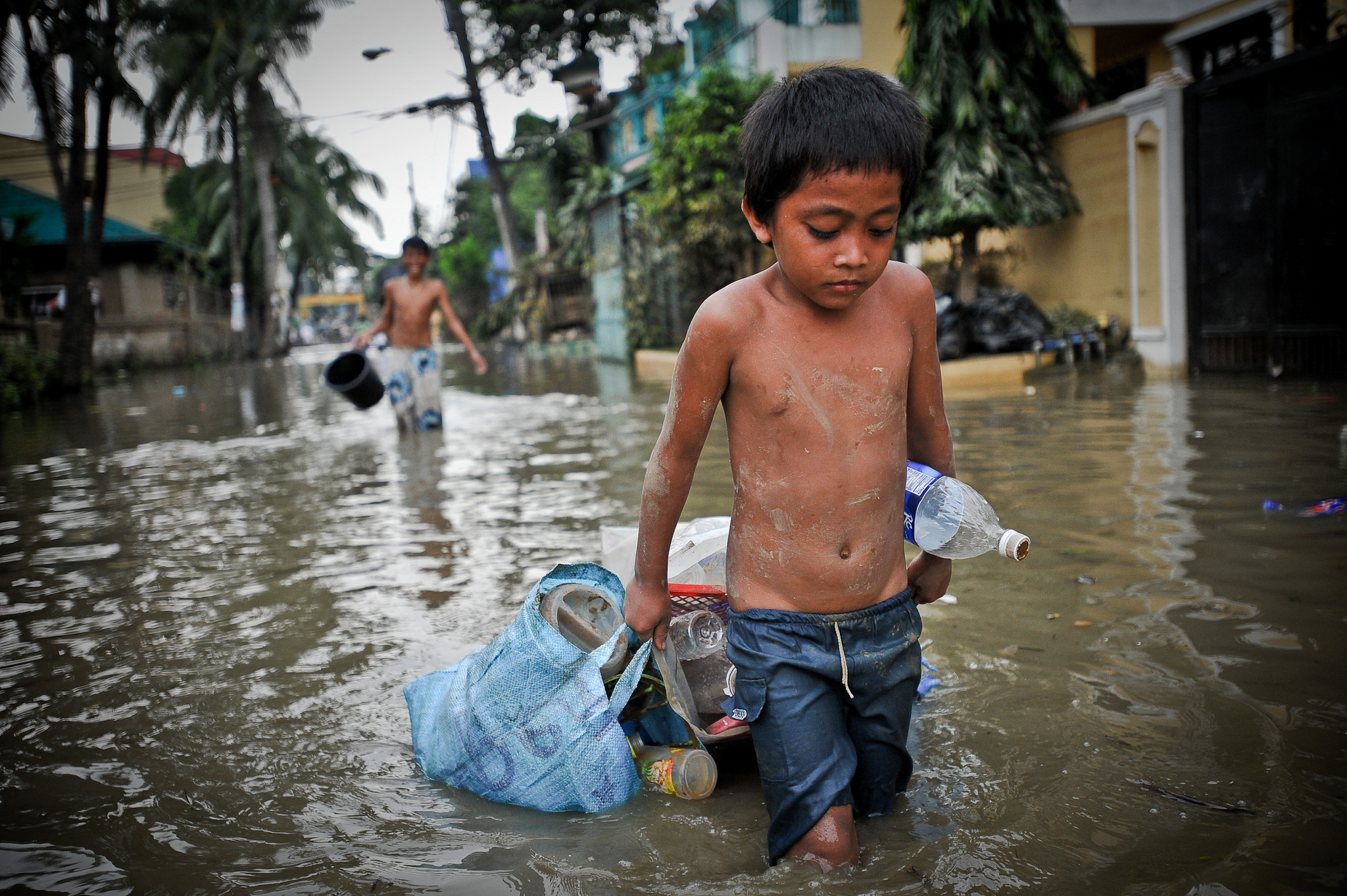 Young boy after Typhoon Ketsana Manilla Philippines