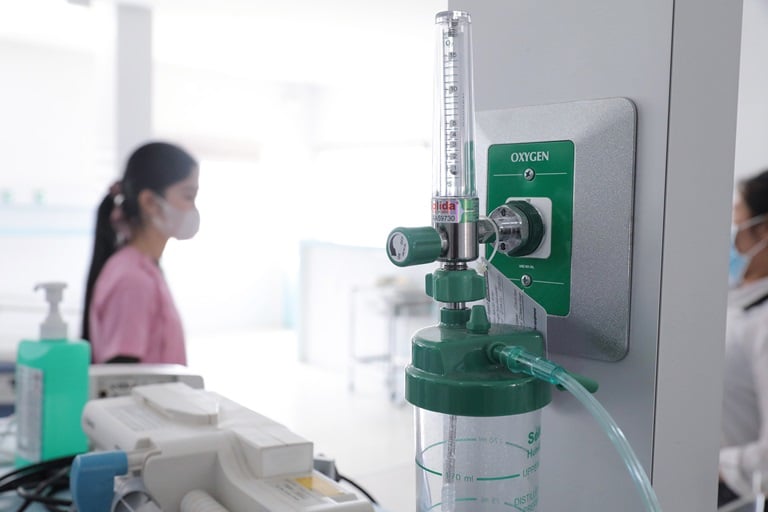 man checking the oxygen tanks
